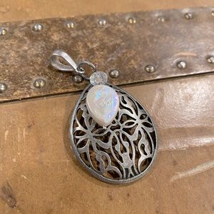 Metal and faux pearl pendant